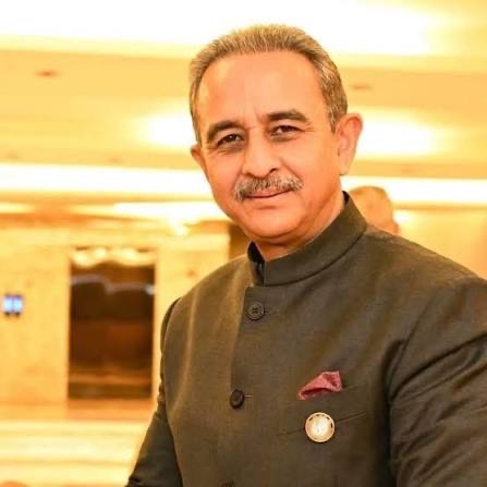 Kirtivardhan Singh in a dark bandhgala jacket